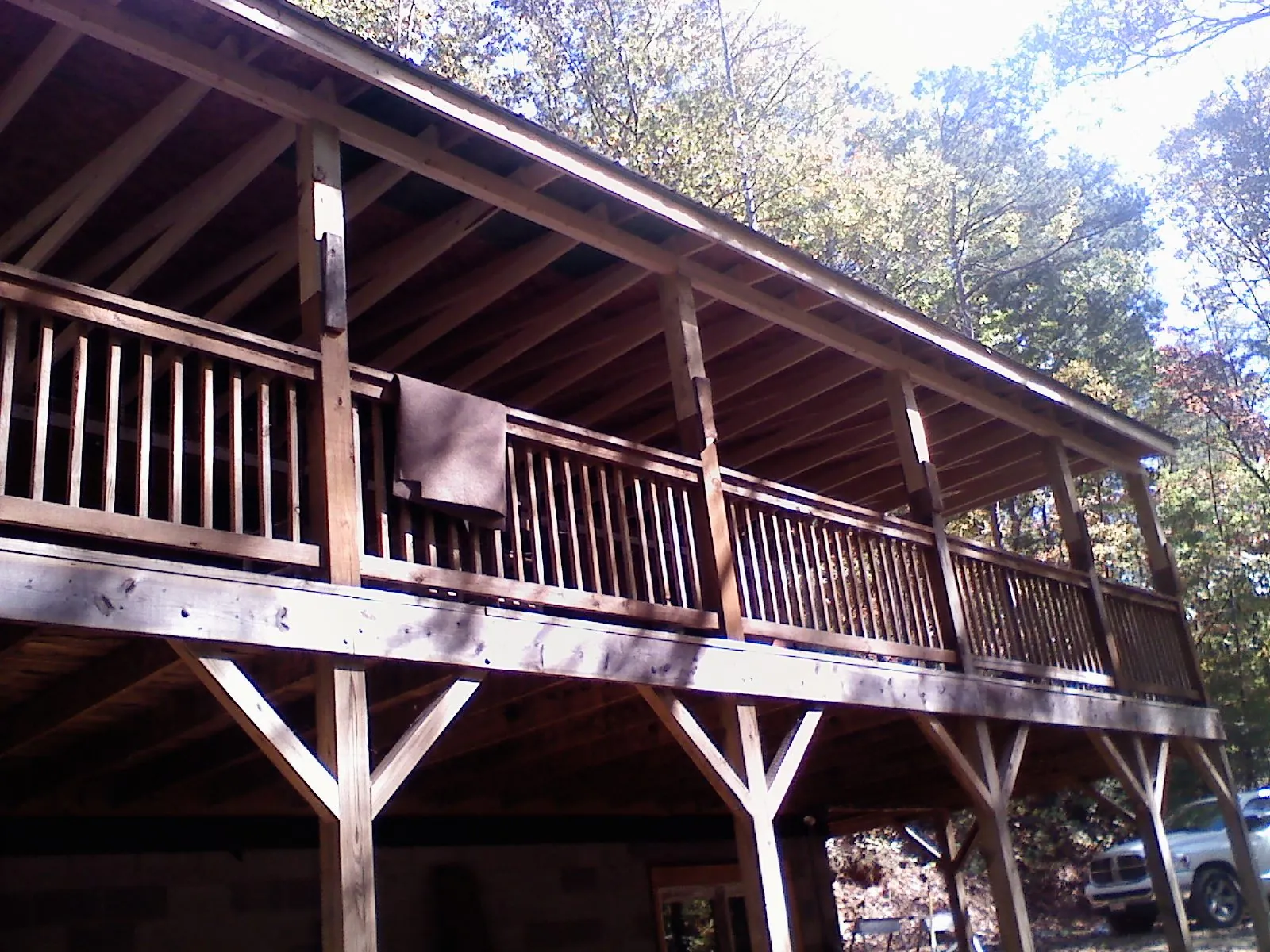 Timber framing under a new elevated porch and deck — Roof Leak Repair in Cambridge Springs by Roofing Brothers